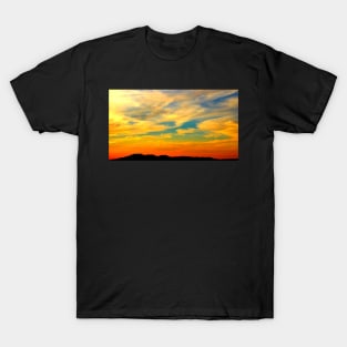 Serene sunset scenery with clement warm clouds standing out from the blue sky T-Shirt